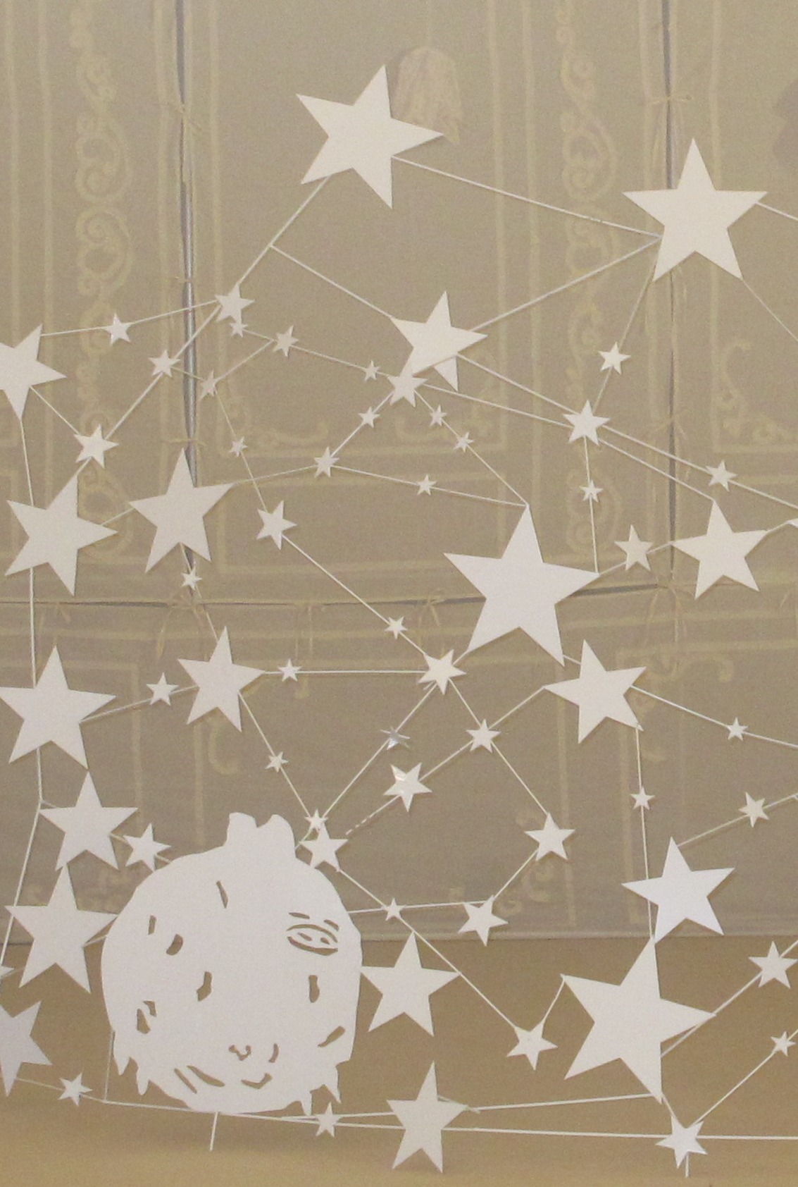 A constellation of paper stars from the Puella Aeterna runway film